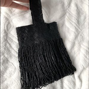 Black hand beaded purse.
